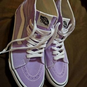 Women's size 8.5 NWOT Lavender Van's. Never worn. Smoke-free, pet free home.